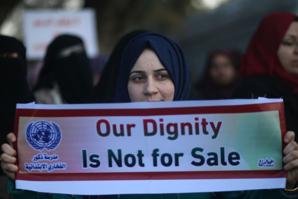 Palestinian women take part in a protest in Gaza City on January 29, 2018 against the US move to freeze funding for the UN agency for Palestinian refugees. Photo: AFP