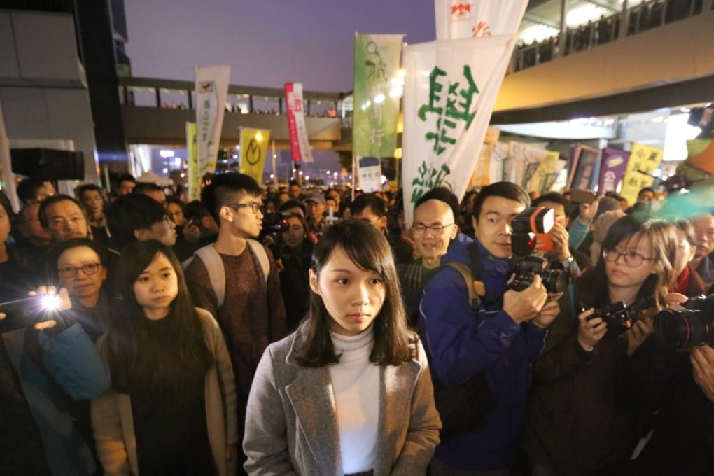 Agnes Chow Ting (centre) attends a rally at Tamar in Admiralty after she was barred from contesting the upcoming Legislative Council by-election. Photo: Felix Wong