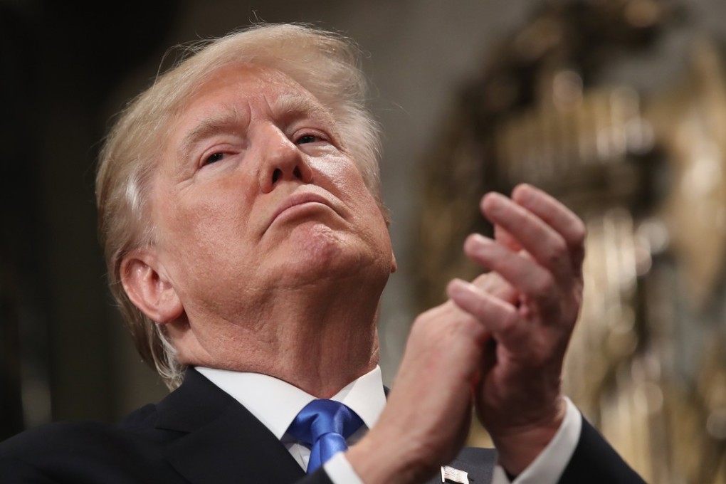 US President Donald Trump claps after finishing his state-of-the-union address in the chamber of the US House of Representatives in Washington on Tuesday. Photo: EPA-EFE