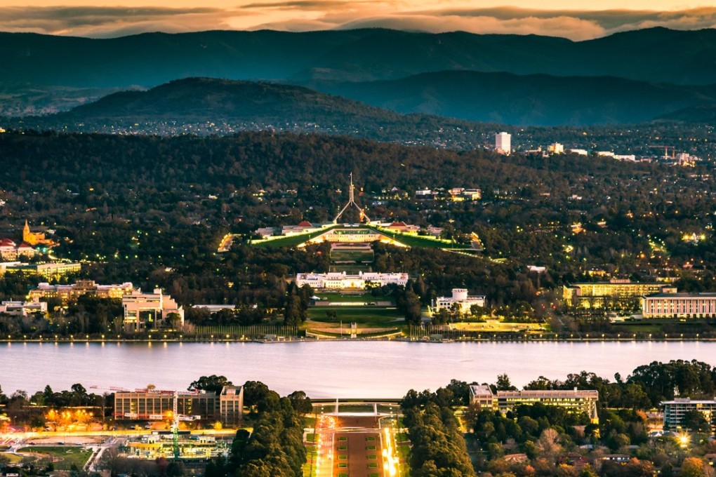 Australia’s capital Canberra, and the country’s Parliament House.
