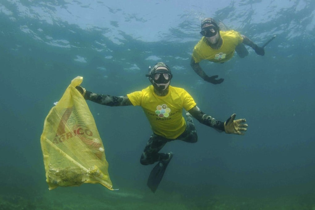 Free divers clean up plastic in the ocean near Malta. Photo: Handout