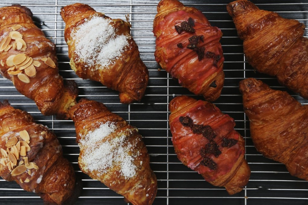 Croissants are the most popular pastry product at Plumcot in Tai Hung. This picture shows (from left) almond croissants, mango and coconut croissants, strawberry croissants, and regular croissants. Photo: Xiaomei Chen