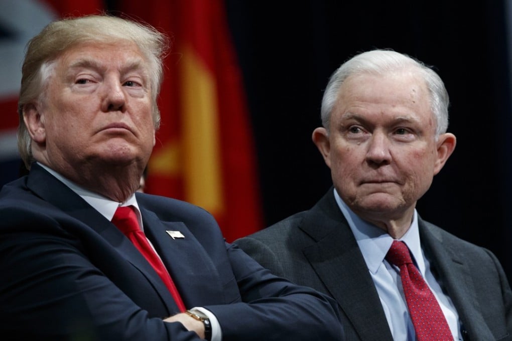 President Donald Trump sits with Attorney General Jeff Sessions during the FBI National Academy graduation ceremony earlier this week. Photo: AP