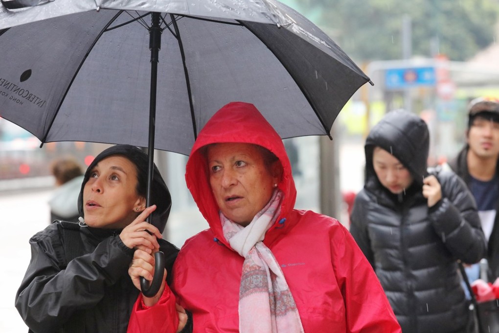 Out come the layers as the city experiences a cold January. Photo: Felix Wong