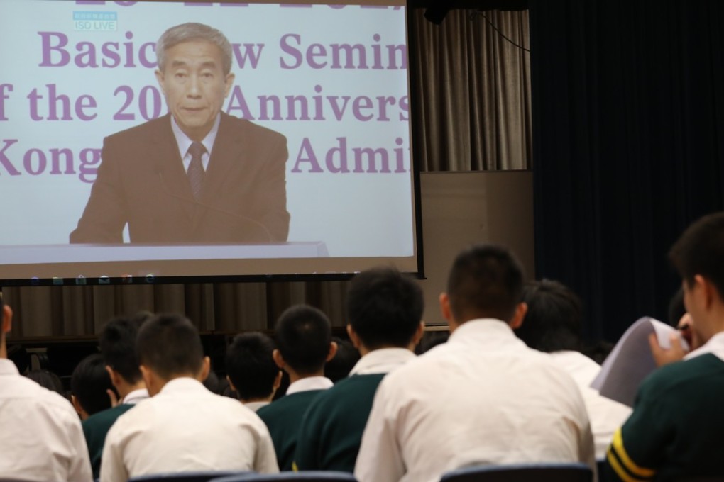 Secondary school students watch the live broadcast of a Basic Law seminar featuring Li Fei, the related committee chairman, last November 16. Photo: Robert Ng