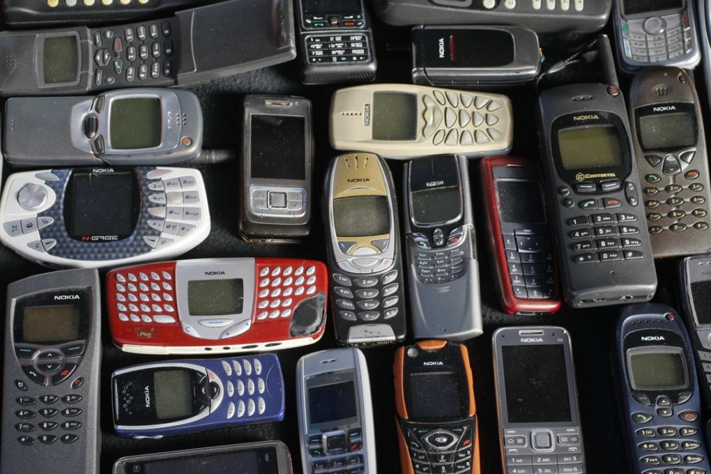 A collection of Nokia mobile phones. The company sold its mobile handset business to Microsoft for €5.44 billion in 2013. Photo: Reuters