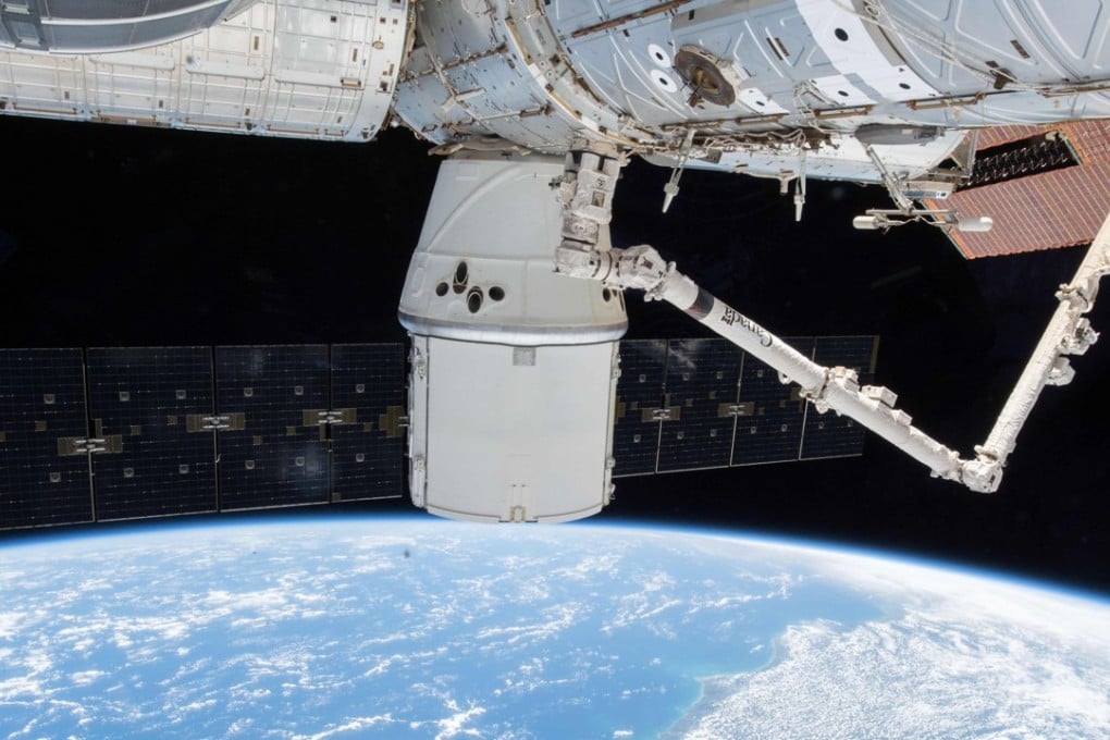 This Nasa photo obtained January 26, 2018 shows the SpaceX Dragon resupply ship with its dual outstretched solar arrays attached to the Harmony module as the International Space Station orbited above Brazil on January 7, 2018. Russia is planning to send space tourists in the coming years. Photo: AFP