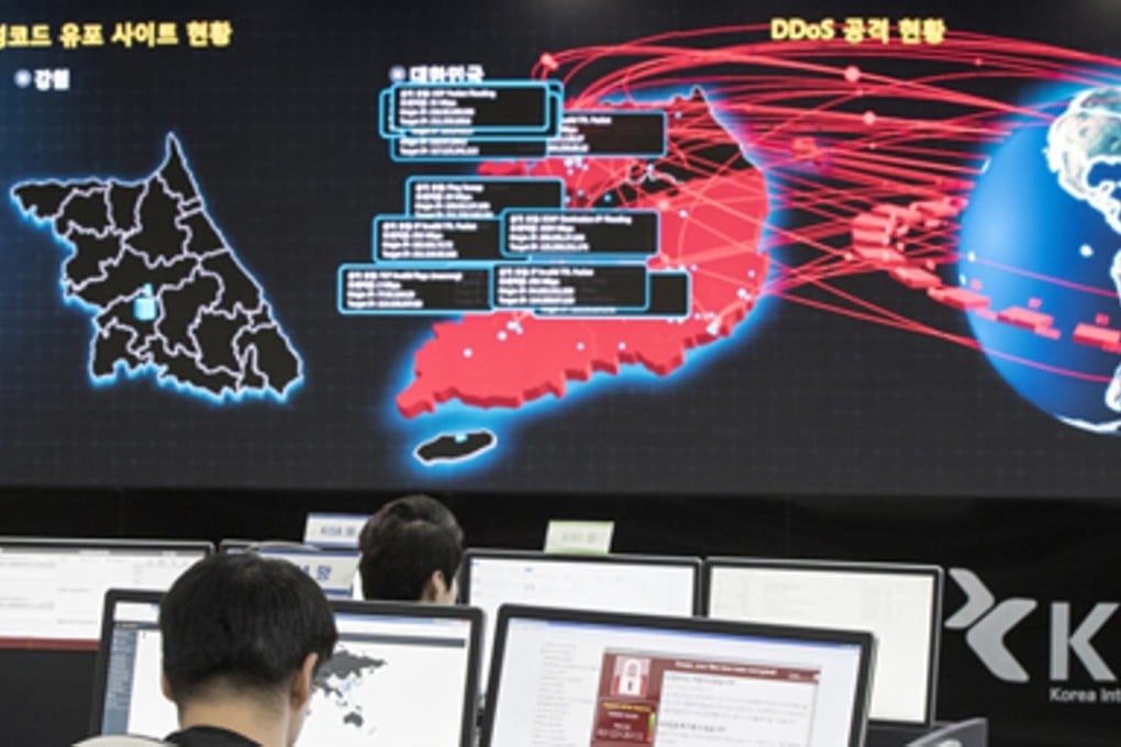 In this May 15, 2017, file photo, employees watch electronic boards monitoring possible ransomware cyberattacks at the Korea Internet and Security Agency in Seoul, South Korea. There is strong evidence that North Korea allows people involved in hacking or cyber operations the access necessary for a deep engagement in cyberattacks and cybercrime. Photo: Yonhap via AP