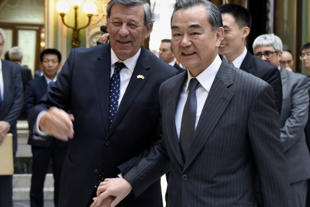 Chinese Foreign Minister Wang Yi (right) meets his Uruguayan counterpart Rodolfo Nin Novoa in Montevideo, capital of Uruguay, last month. Photo: Xinhua