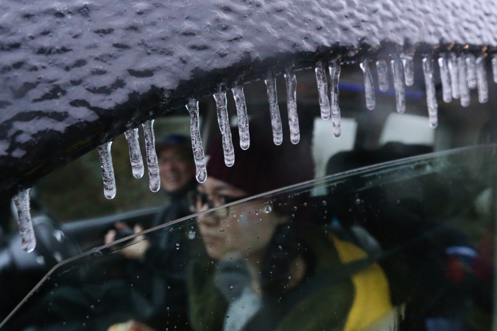 Ice is seen on a car at Tai Mo Shan in 2016. Photo: Felix Wong