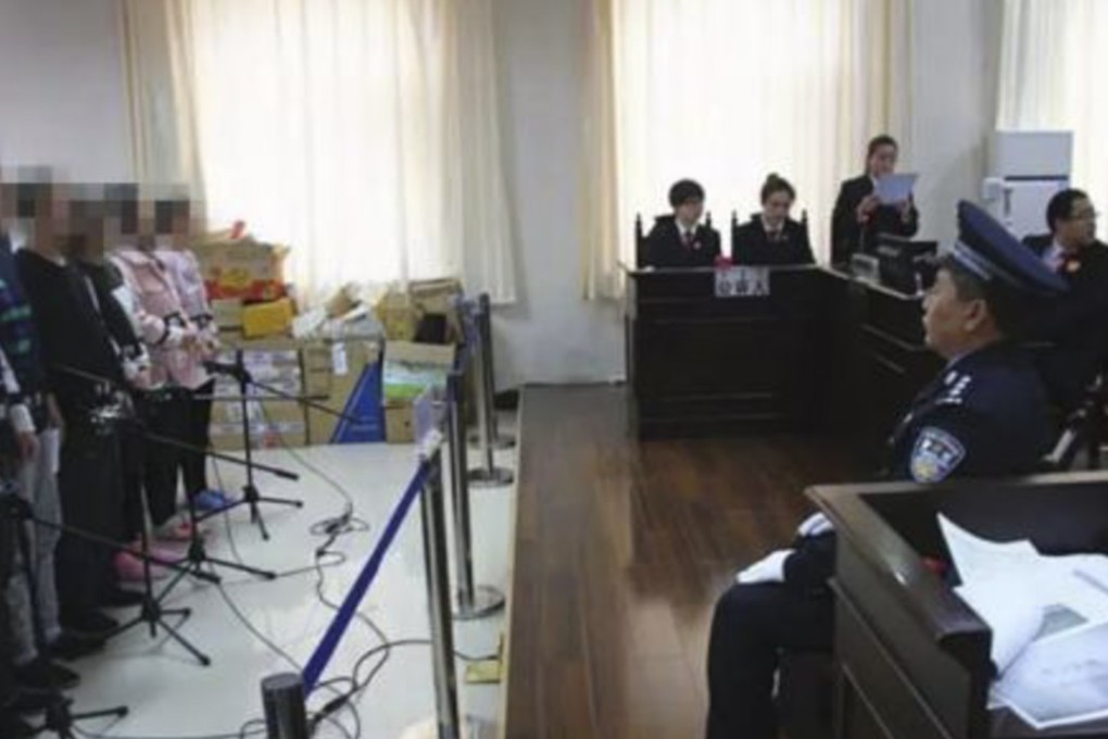Defendants in the case face court in ordos, Inner Mongolia. Photo: Chinanews.com