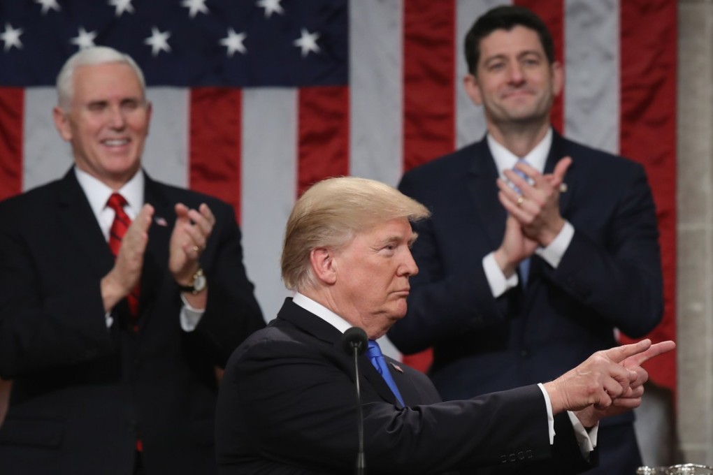 US President Donald Trump delivers his first State of the Union address inside the House Chamber in Washington on January 30 as Vice-President Mike Pence (left) and House Speaker Paul Ryan applaud. Photo: AFP