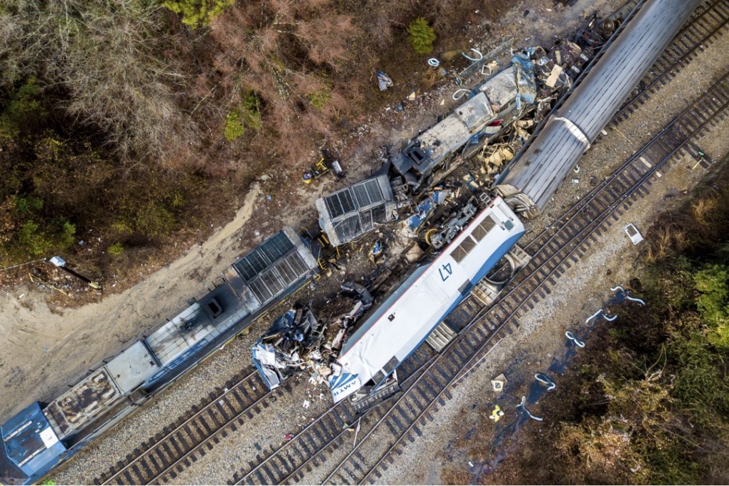 An aerial view shows the aftermath of an early morning train crash on Sunday between an Amtrak train, bottom right, and a CSX goods train, top left, in Cayce, South Carolina. Photo: AP