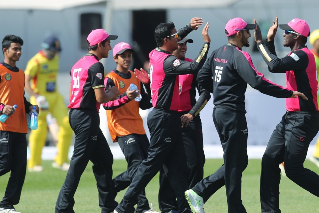 Hung Hom JD Jaguars players celebrate a wicket against City Kaitak. Photos: Winson Wong
