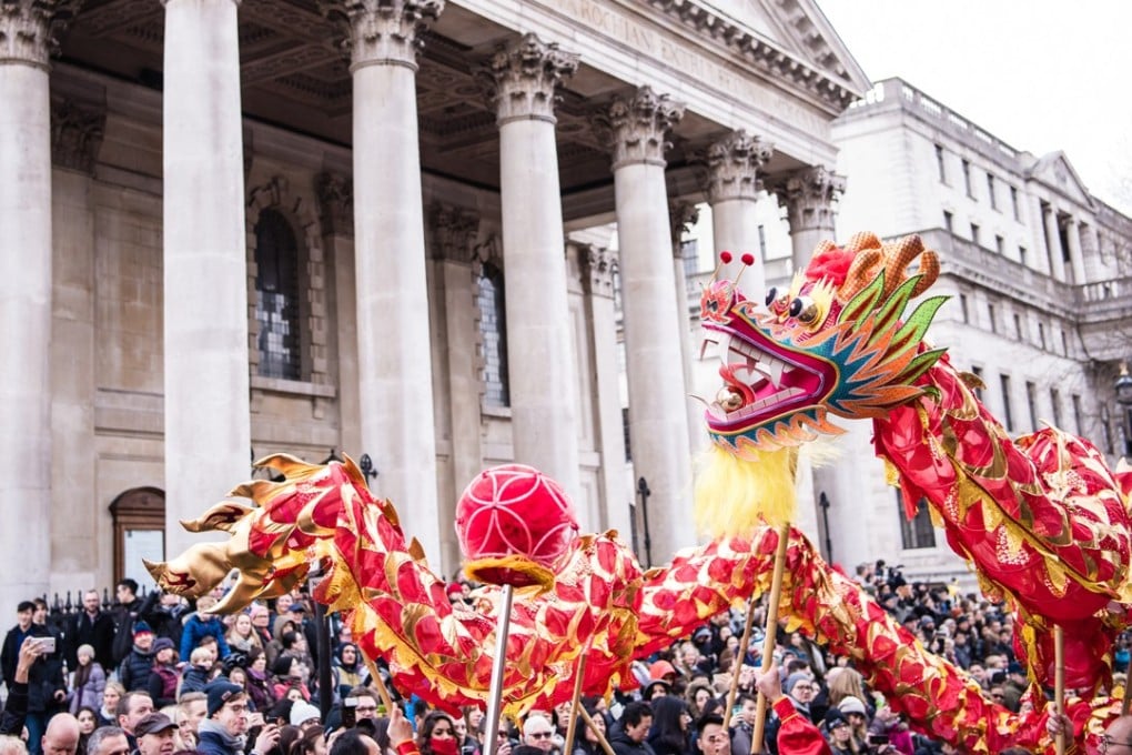 A dragon float forms part of the Lunar New Year parade as it passes the National Gallery in Trafalgar Square in London in 2017.