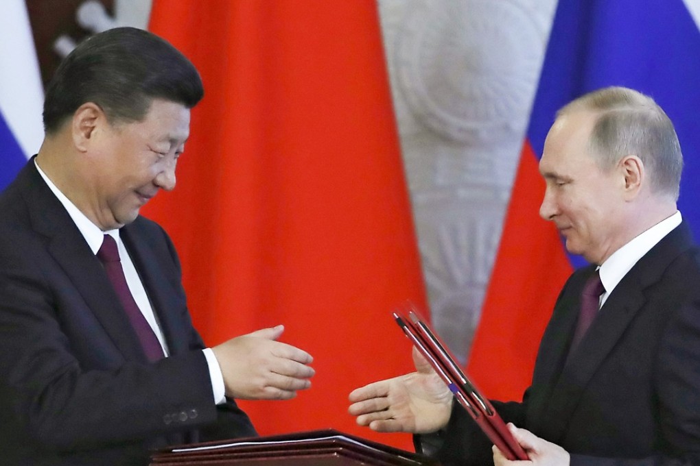 Russian President Vladimir Putin (right) and Chinese President Xi Jinping at a ceremony following their talks in the Kremlin in Moscow in July 2017. China could be learning from Russian activities in cyberspace. Photo: AP