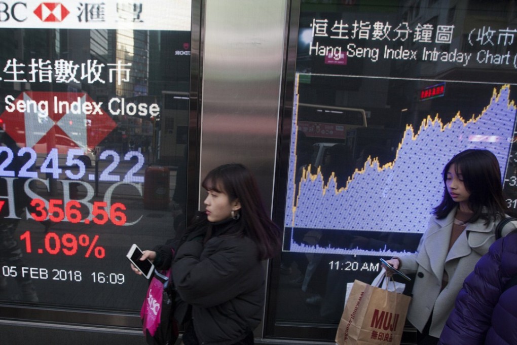 Hong Kong stocks were hammered lower on Tuesday as traders sought to exit stock positions as what some analysts described as ‘panic selling’. Photo: EPA