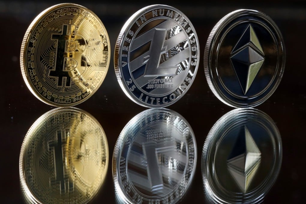 A bitcoin token (left) a litecoin token (centre) and an ethereum token seen in this arranged photograph. Photo: Bloomberg