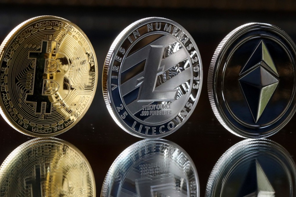 A Nobel Prize winner has warned against central banks issuing their own cryptocurrency, saying it may lead to catastrophe. Pictured, left to right: A bitcoin token, a litecoin token and an ethereum token. Photo: Bloomberg