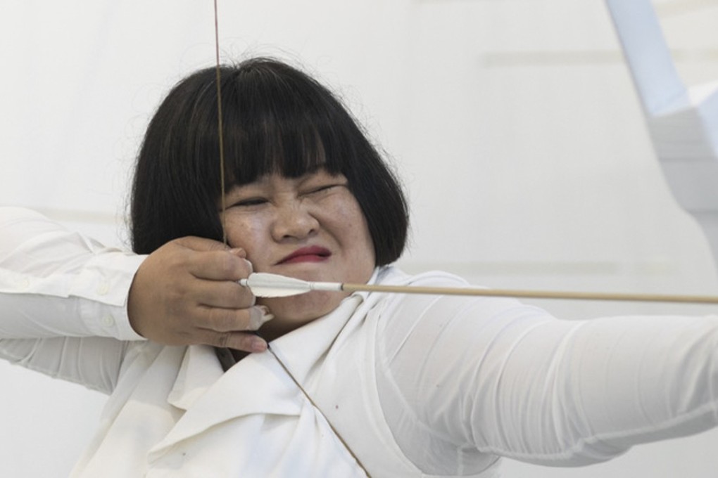 Melati Suryodarmo performs her performance art Transaction of Hollows (2018). Photo: Courtesy of ShanghART Gallery