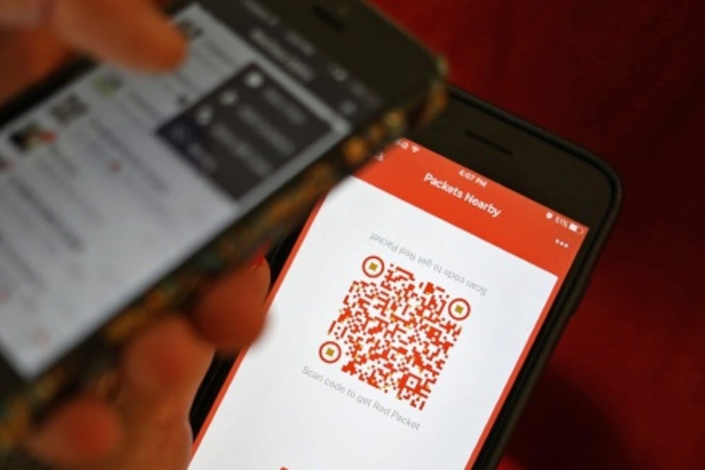 Major Chinese internet companies like Alibaba Group Holding and Tencent Holdings are competing to build up brand awareness and increase the number of users on their apps through digital red packet promotions during the Lunar New Year. Photo: EPA