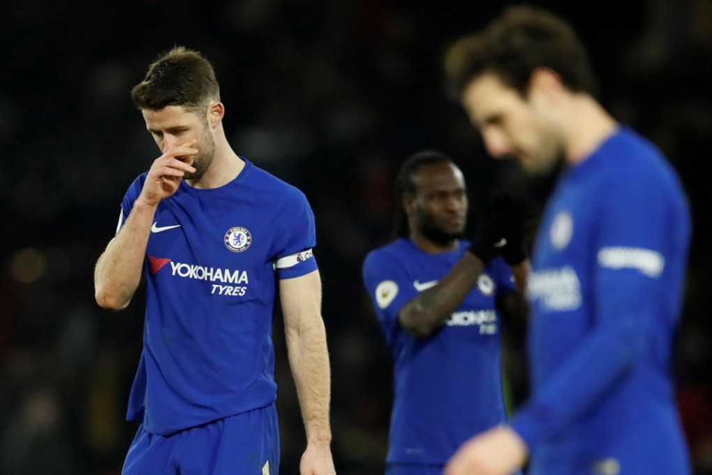 Chelsea’s Gary Cahill and his teammates look dejected after their 4-1 defeat by Watford. Photo: Reuters