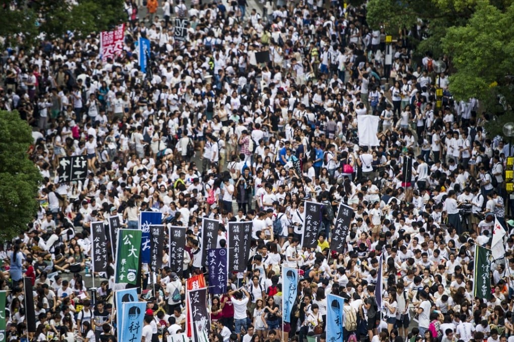 Students gather at Chinese University to mark the start of a week-long class boycott to protest at the central government’s refusal to grant Hong Kong full universal suffrage. This protest culminated in a march to the Hong Kong government headquarters in Admiralty and kicked off the Occupy Central movement. Photo: AFP