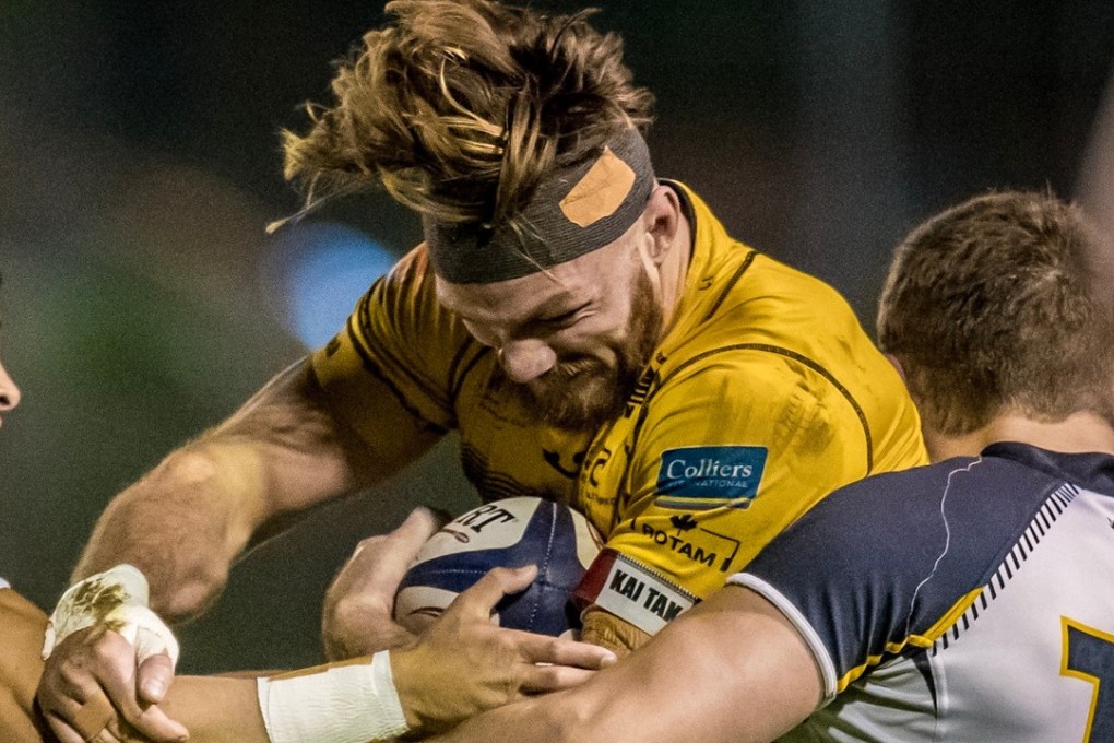 Joe Ellyatt feels the heat for Tigers in their win over HKCC. Photo: HKRU