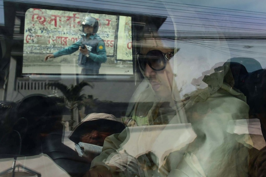 Khaleda Zia arriving at court to hear the verdict in her corruption case in Dhaka on February 8, 2018. Photo: AFP