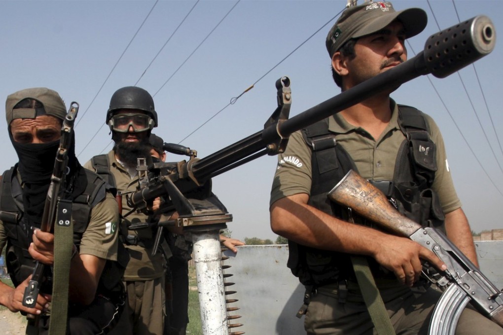 Soldiers arrive to repel an attack on an air force base by the Taliban in Peshawar, Pakistan, in September. Three individuals (not pictured) have been sanctioned by the US for allegedly aiding the Taliban and al-Qaeda. Photo: Reuters