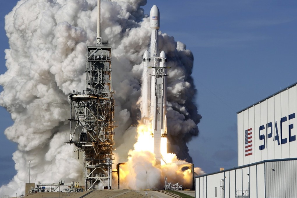 A Falcon 9 SpaceX heavy rocket lifts off from the Kennedy Space Centre in Cape Canaveral, Florida on Tuesday. Photo: AP