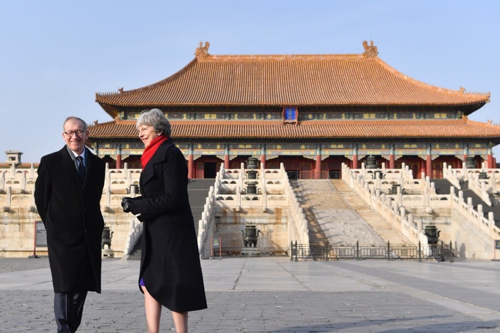 British Prime Minister Theresa May and her husband Philip pictured during a visit to the Forbidden City as part of her trip to China last week. Photo: Xinhua