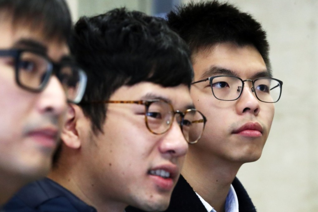 (L-R)Activist Alex Chow Yong-kang, Demosisto's Chairman Nathan Law Kwun-chung, and Demosisto's Secretary General Joshua Wong Chi-fung attend a radio programme at the Commercial Radio in Kowloon Tong. Photo: Nora Tam