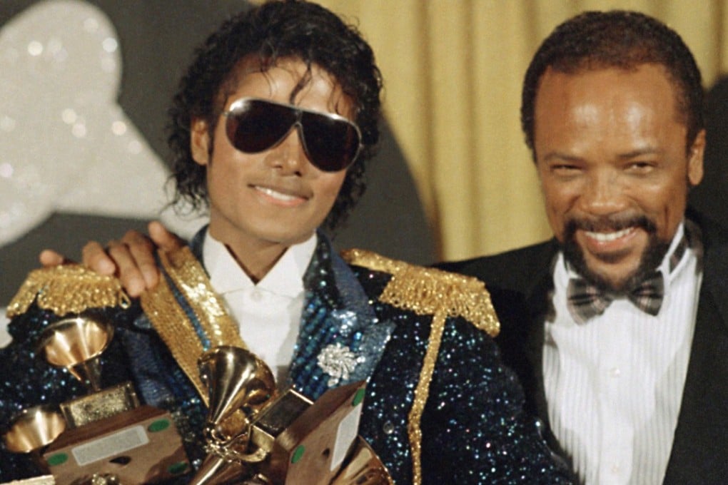 In this February 28, 1984, file photo, Michael Jackson, left, holds eight awards as he poses with producer Quincy Jones at the Grammy Awards in Los Angeles. Photo: AP