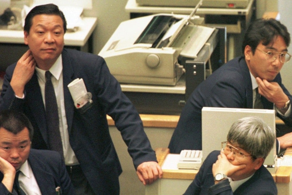 Traders at the Tokyo Stock Exchange in 1997. Photo: AP