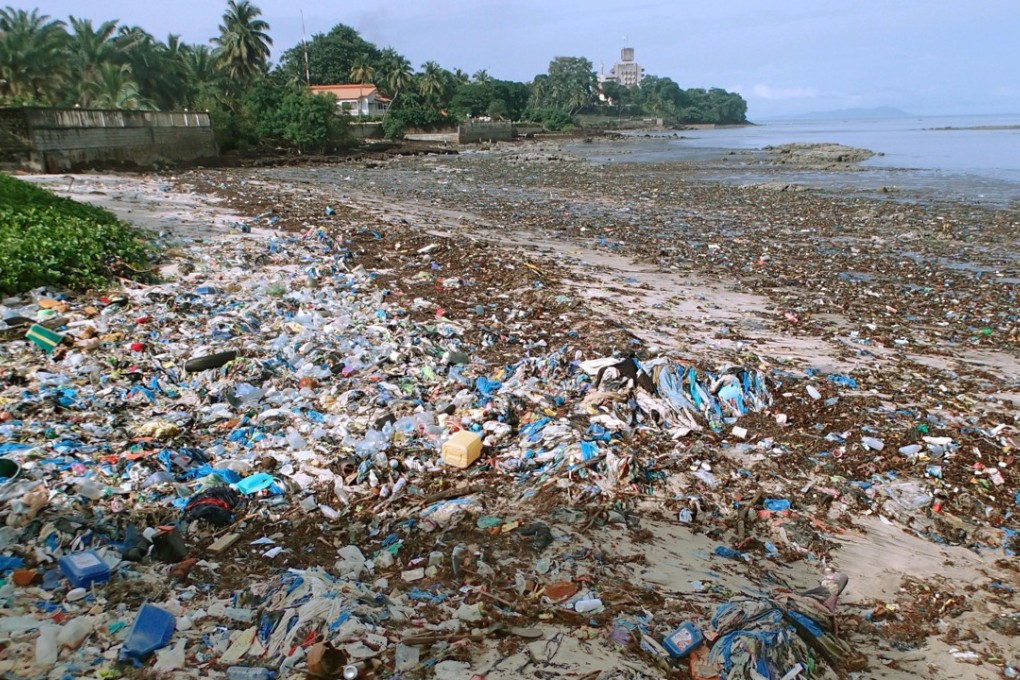 Plastic waste washed ashore in Guinea. According to one estimate, 6.3 billion tonnes of plastic has been discarded as waste over the past century. Photo: Kyodo