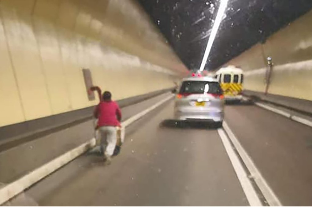 The woman pushed her trolley through the Cross-Harbour Tunnel. Photo: Facebook