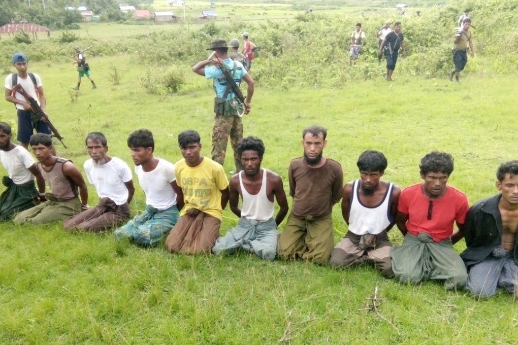 Ten Rohingya Muslim men who are said to have been executed by Myanmar soldiers and dumped in a shallow grave. Photo: Reuters