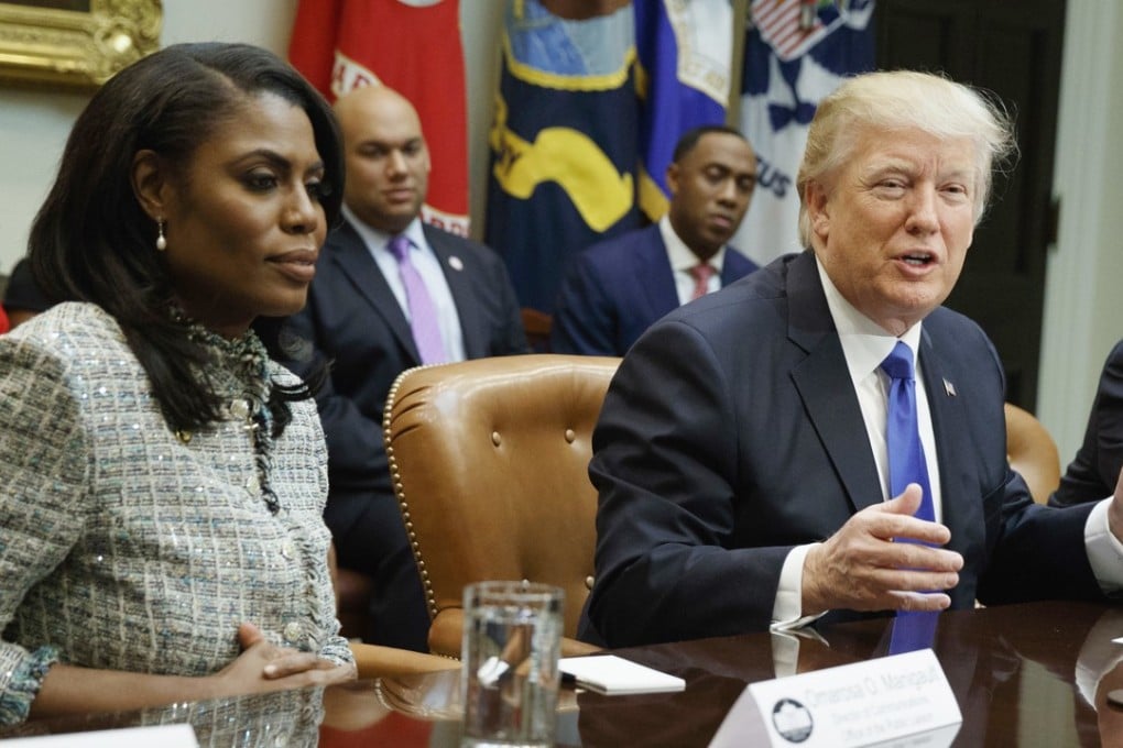 In this February 1, 2017, file photo, US President Donald Trump speaks during a meeting on African American History Month in the Roosevelt Room of the White House in Washington, with Omarosa Manigault. Photo: AP