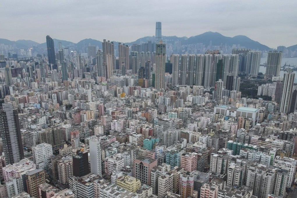 New residential buildings rise in the Tai Kok Tsui district (background) of the Kowloon peninsula. Photo: Roy Issa