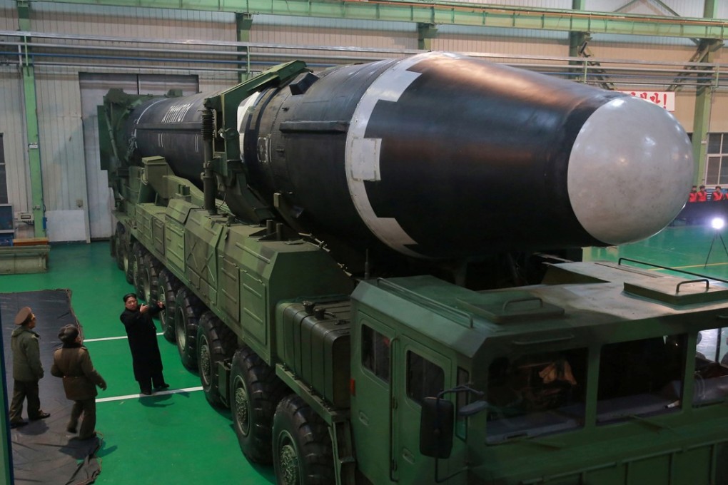 Pyongyang conducted its sixth nuclear test and test-fired more than 20 missiles, including some that could strike the US, in 2017 in defiance of UN Security Council resolutions. Pictured: North Korean leader Kim Jong-un examines an intercontinental ballistic missile. Photo: KCNA via Reuters