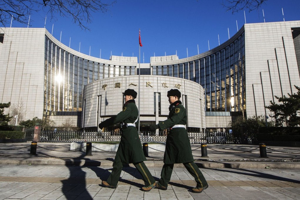 According to data from the People’s Bank of China, financial institutions had 102 trillion yuan worth of assets under management at the end of 2016. Should a small percentage of these assets turn sour, it could result in systemic risks. Photo: Bloomberg
