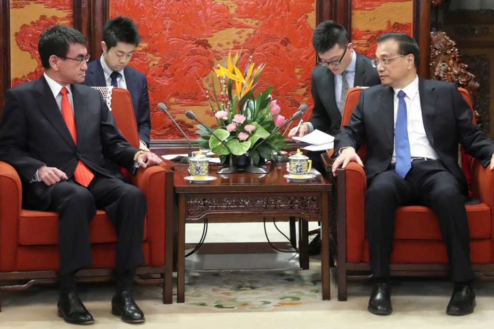 Japanese Foreign Minister Taro Kono (left) meets Chinese Premier Li Keqiang (right) in Beijing in January 28. Japan is now looking to counter China’s Belt and Road Initiative, experts say. Photo: Xinhua