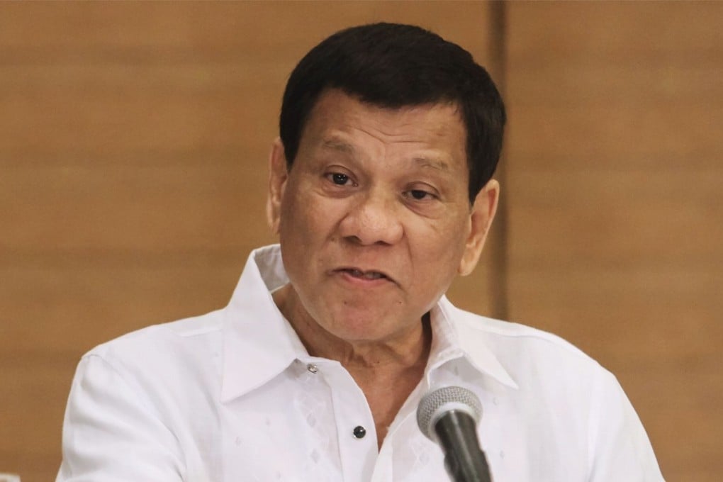 Philippine President Rodrigo Duterte gestures as he speaks during a press conference in Davao City on Friday. He claimed that he cannot be subjected to a human rights investigation into the thousands of people killed extrajudicially in his drugs war. Photo: AFP