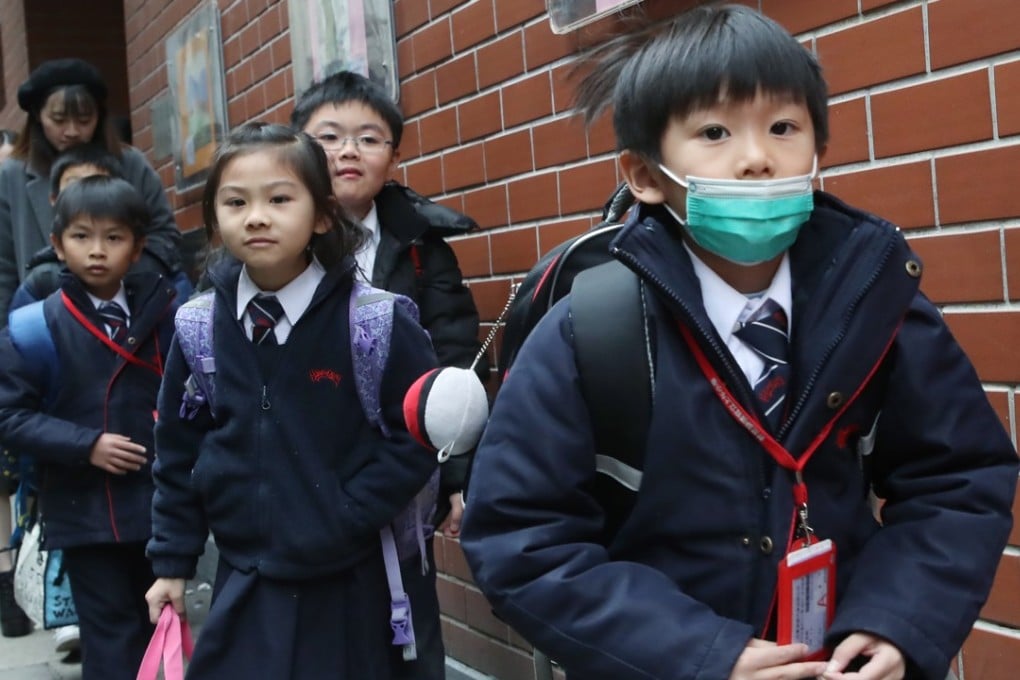 Children outside Hennessy Road Government Primary School in Wan Chai. Photo: Edward Wong