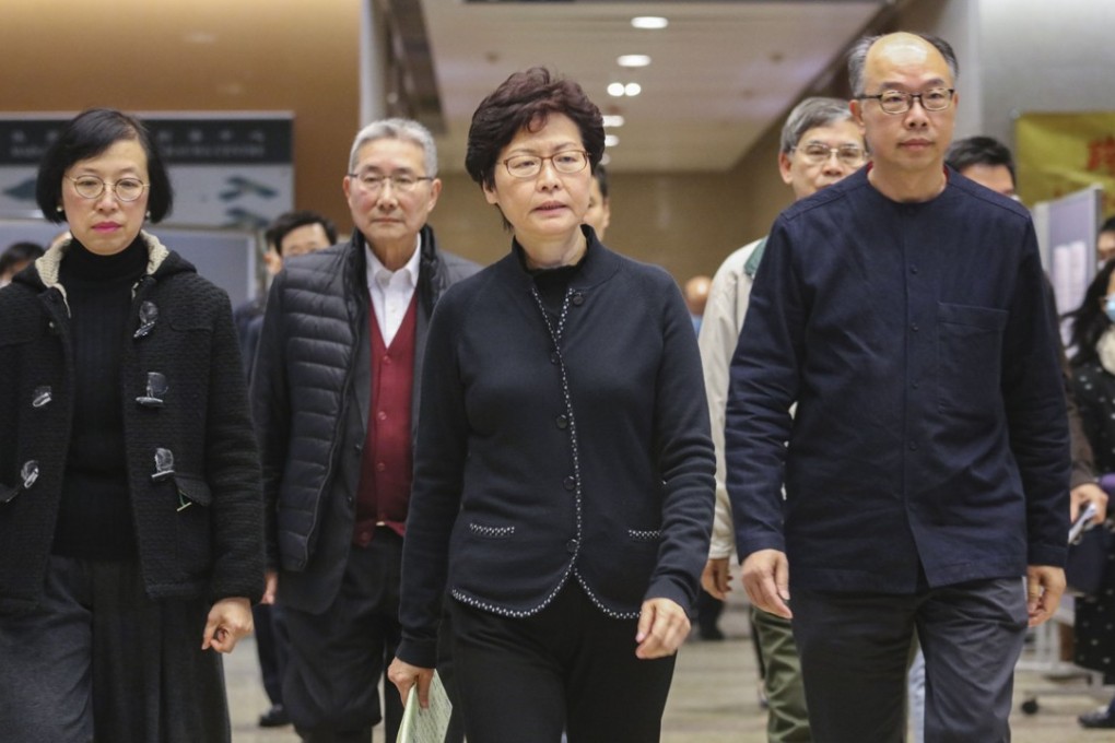 Hong Kong leader Carrie Lam (centre) and other top officials speak on the bus tragedy on Sunday. Photo: Felix Wong