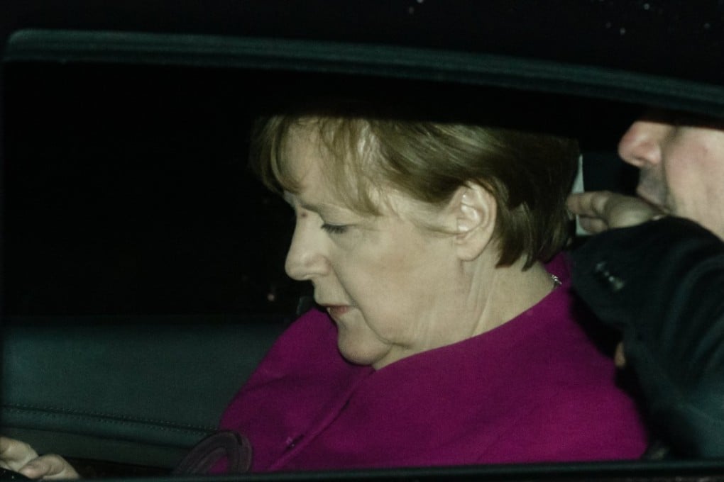 German Chancellor and Chairwoman of the Christian Democratic Union (CDU), Angela Merkel (L), sits in the car next to the spokesman of the German government, Steffen Seibert. Photo: EPA-EFE