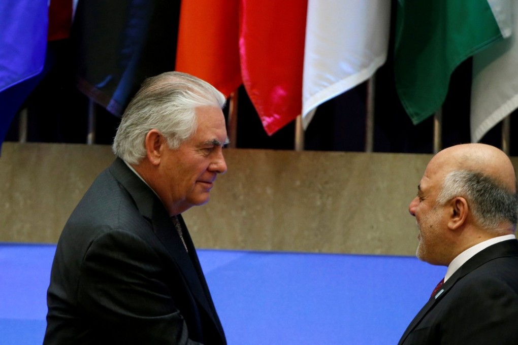 US Secretary of State Rex Tillerson greets Iraqi Prime Minister Haider al-Abadi at the State Department in Washington, on March 22,2017. Tillerson has landed in Egypt at the start of a Middle East trip. Photo: Reuters