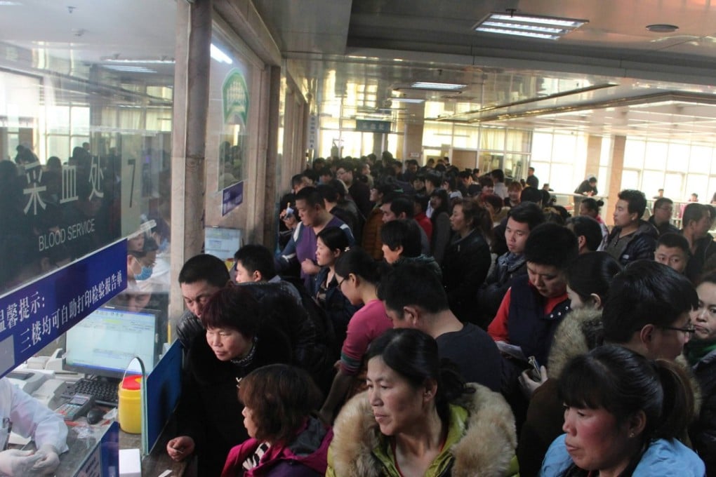 Flu-hit patients line up to have their blood collected at a hospital in Binzhou, Shandong province. Photo: CFP