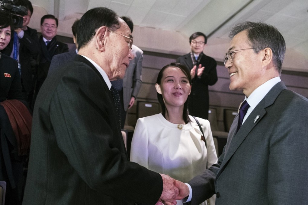 In this photo provided by South Korea Presidential Blue House, South Korean President Moon Jae-in, right, shakes hands with North Korea's nominal head of state Kim Yong-nam as Kim Yo-jong, centre, looks on after a performance by North Korea's Samjiyon Orchestra at the National Theatre in Seoul on Sunday. Kim Yo-jong is North Korean leader Kim Jong-un’s sister. Photo: AP